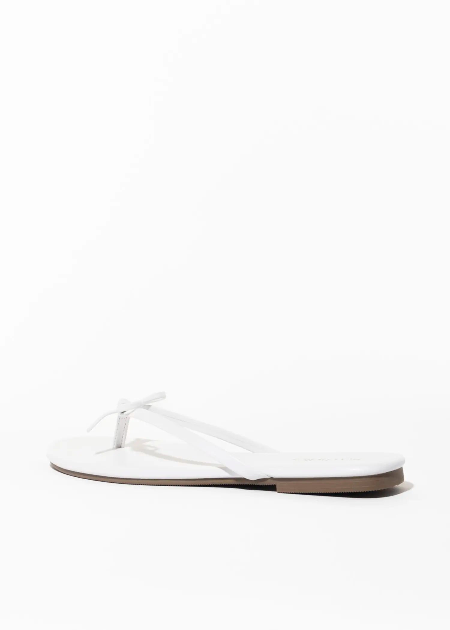 swatch_white wishlist flip flop flat sandals