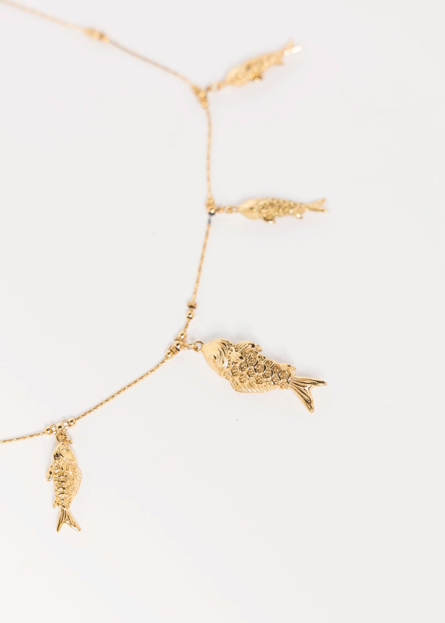 swatch_gold pesci fish necklace