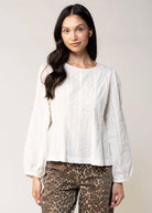 swatch_White aaron and amber ruffle bottom blouse