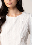 swatch_White aaron and amber ruffle bottom blouse