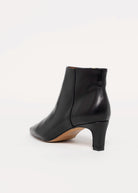 swatch_Black Leather angel alarcon heeled ankle boot
