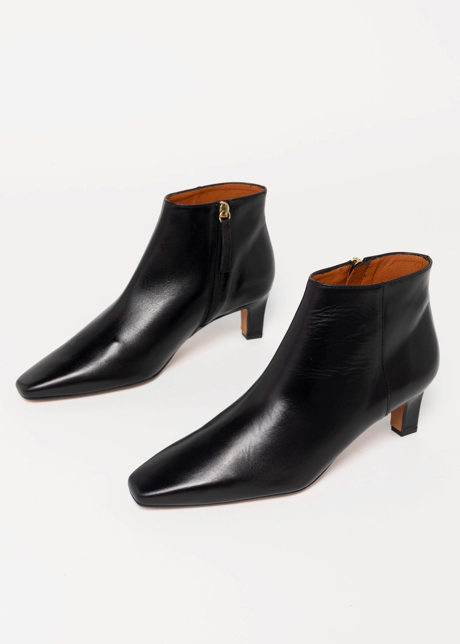 swatch_Black Leather angel alarcon heeled ankle boot