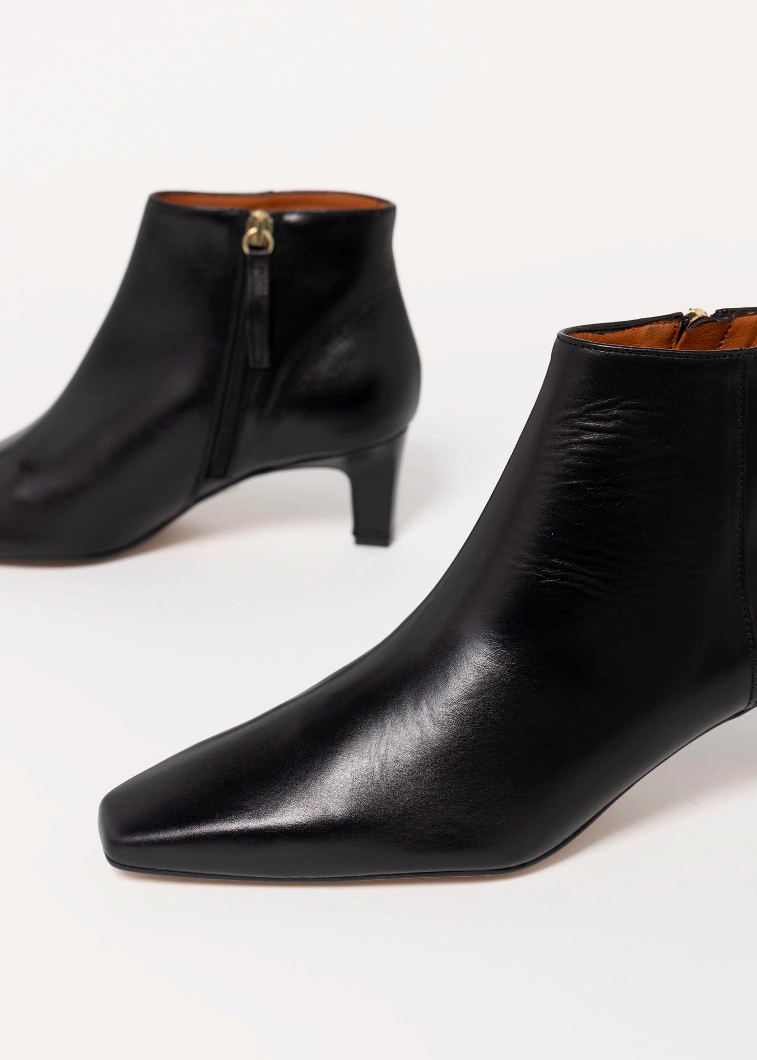 swatch_Black Leather angel alarcon heeled ankle boot