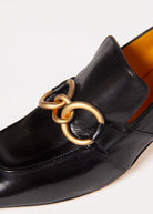 swatch_black leather heeled loafer