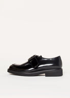 swatch_Black Leather buckle loafer shoes