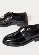 swatch_Black Leather buckle loafer shoes