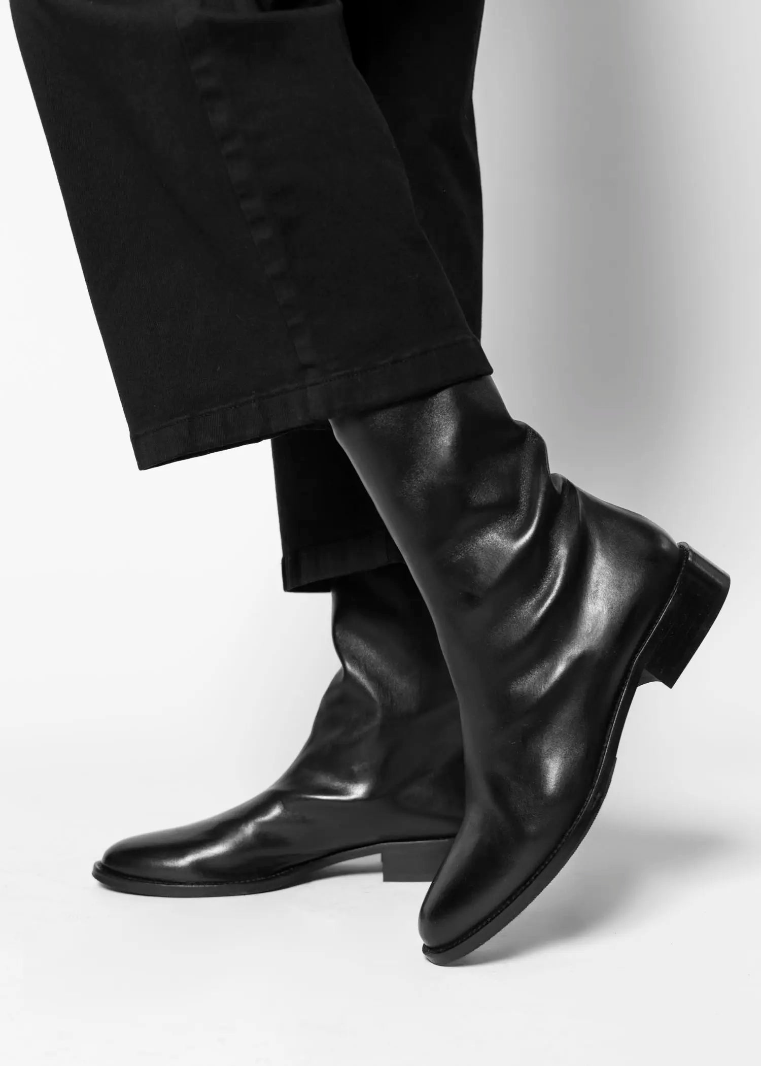 swatch_Black Leather pull on leather bootie shoes