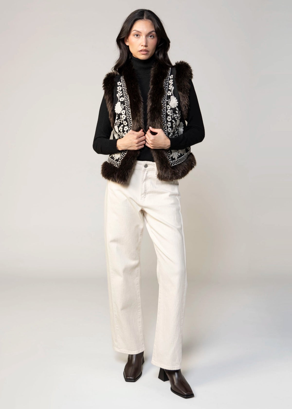 swatch_Black floral embroidery vest with fax fur trim