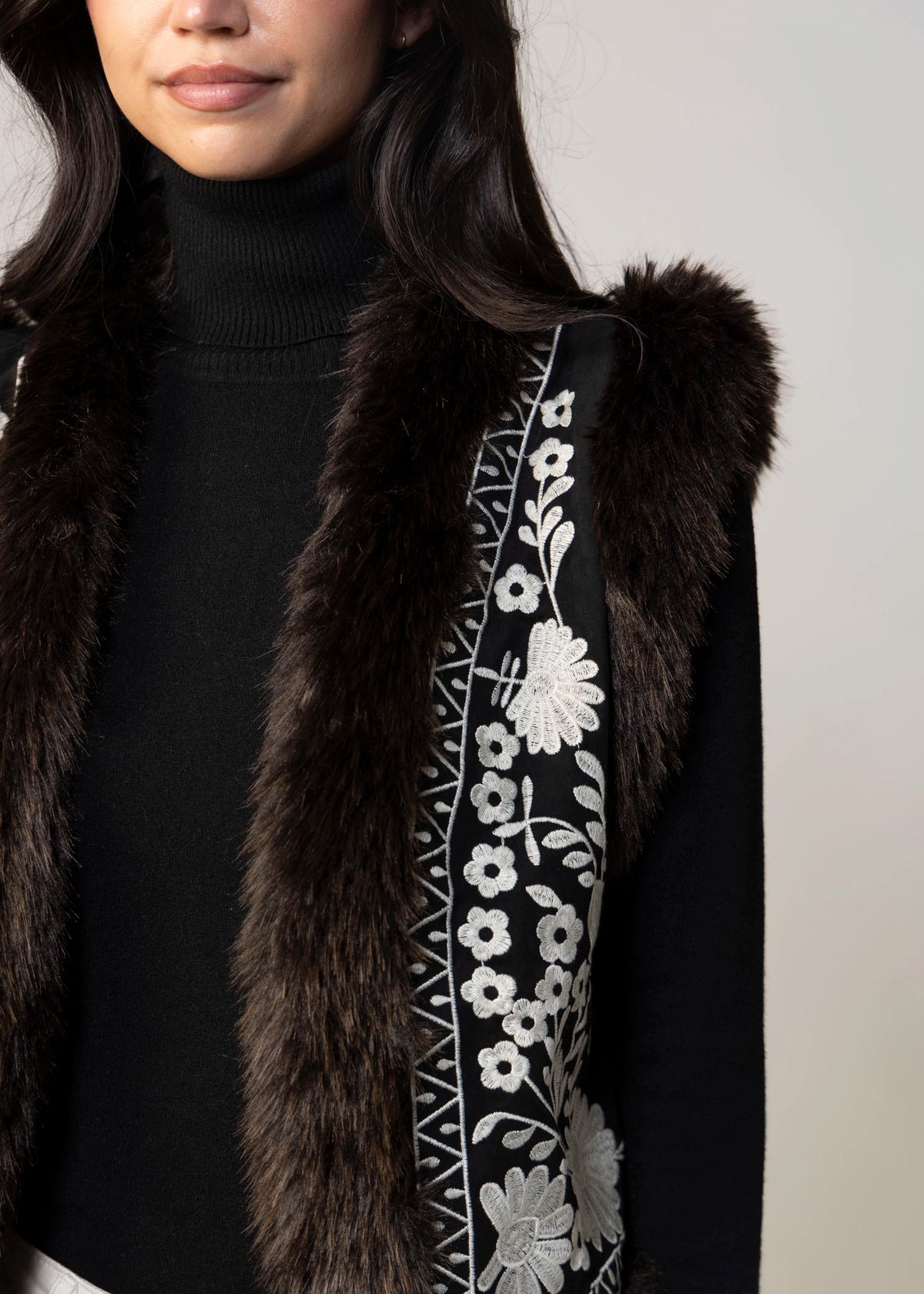 swatch_Black floral embroidery vest with fax fur trim