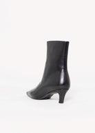swatch_Black Leather tony bianco estelle heeled boot