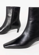 swatch_Black Leather tony bianco estelle heeled boot