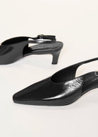 swatch_Black Patent slingback pump shoes