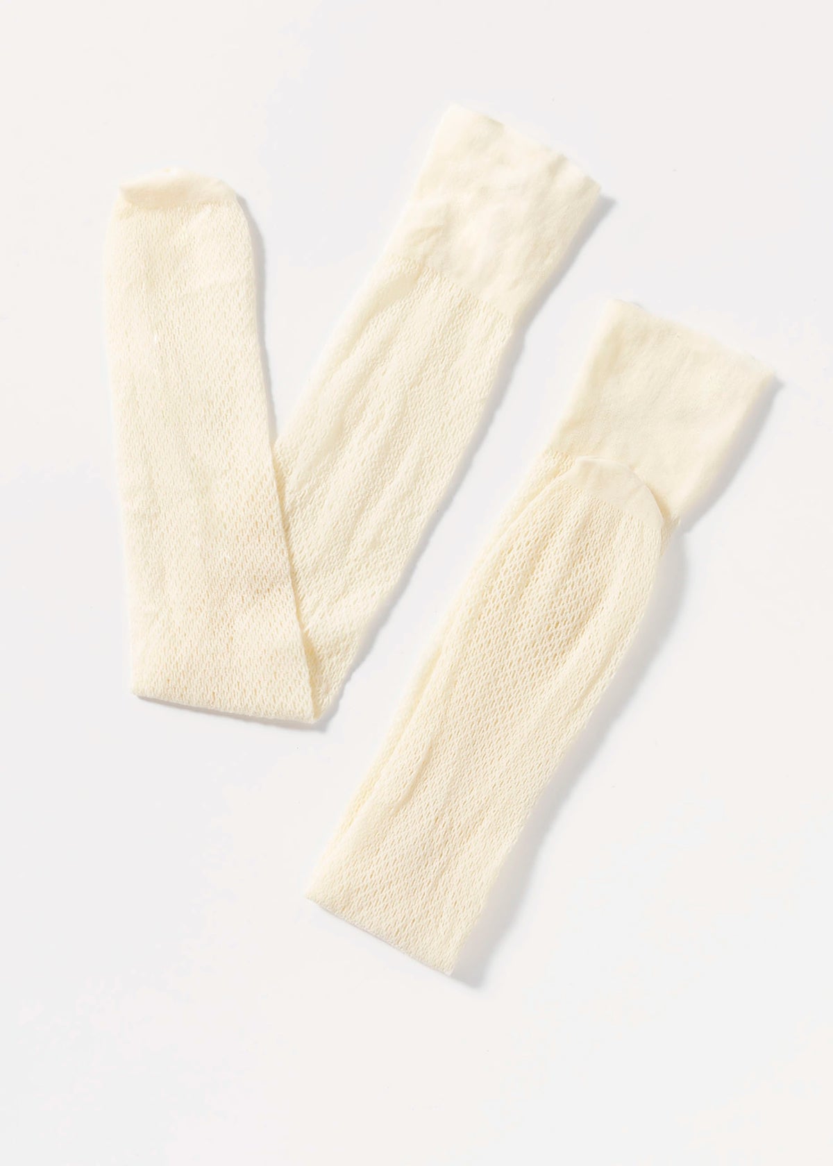swatch_Cream magica fishnet knee high sock