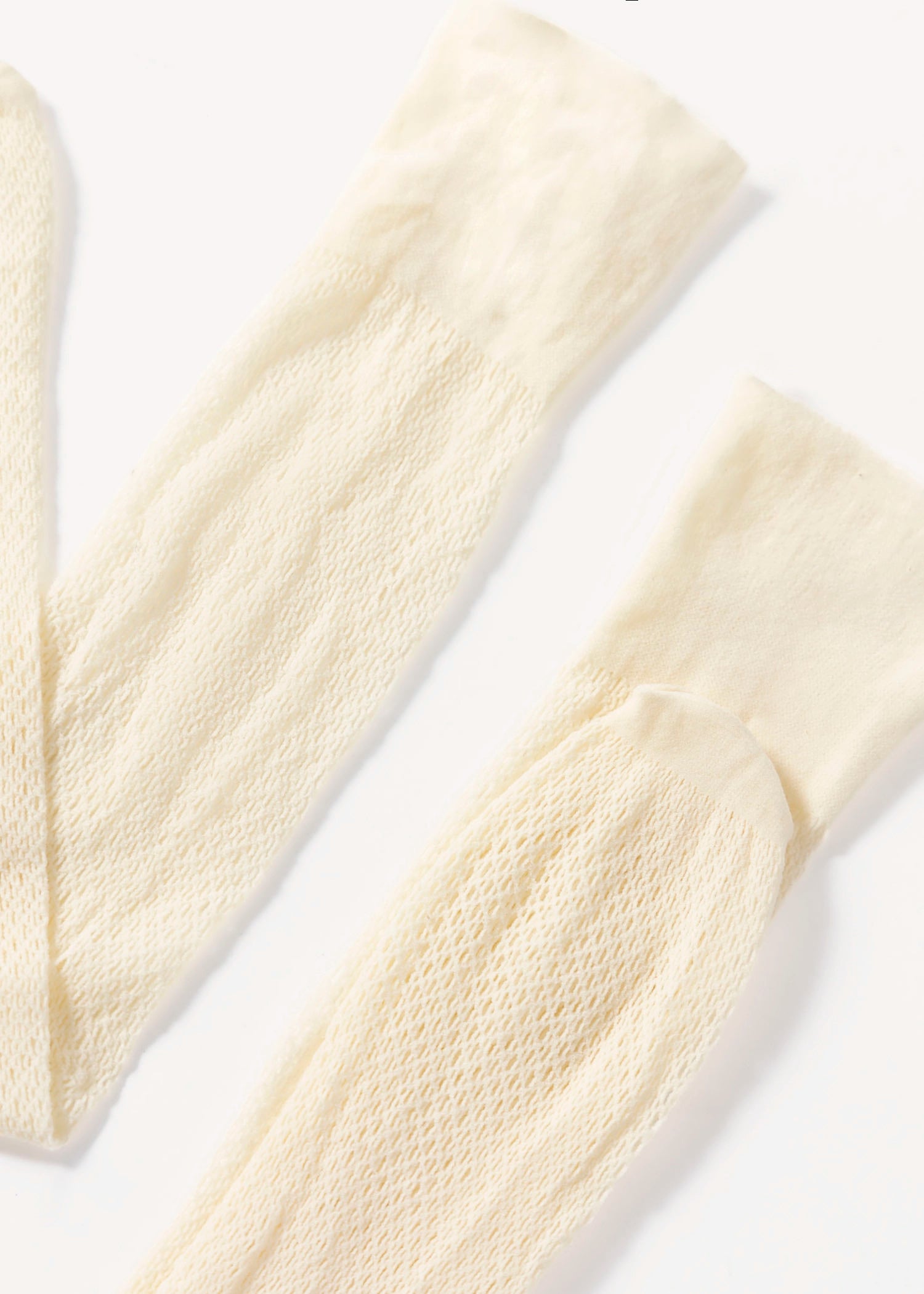 swatch_Cream magica fishnet knee high sock