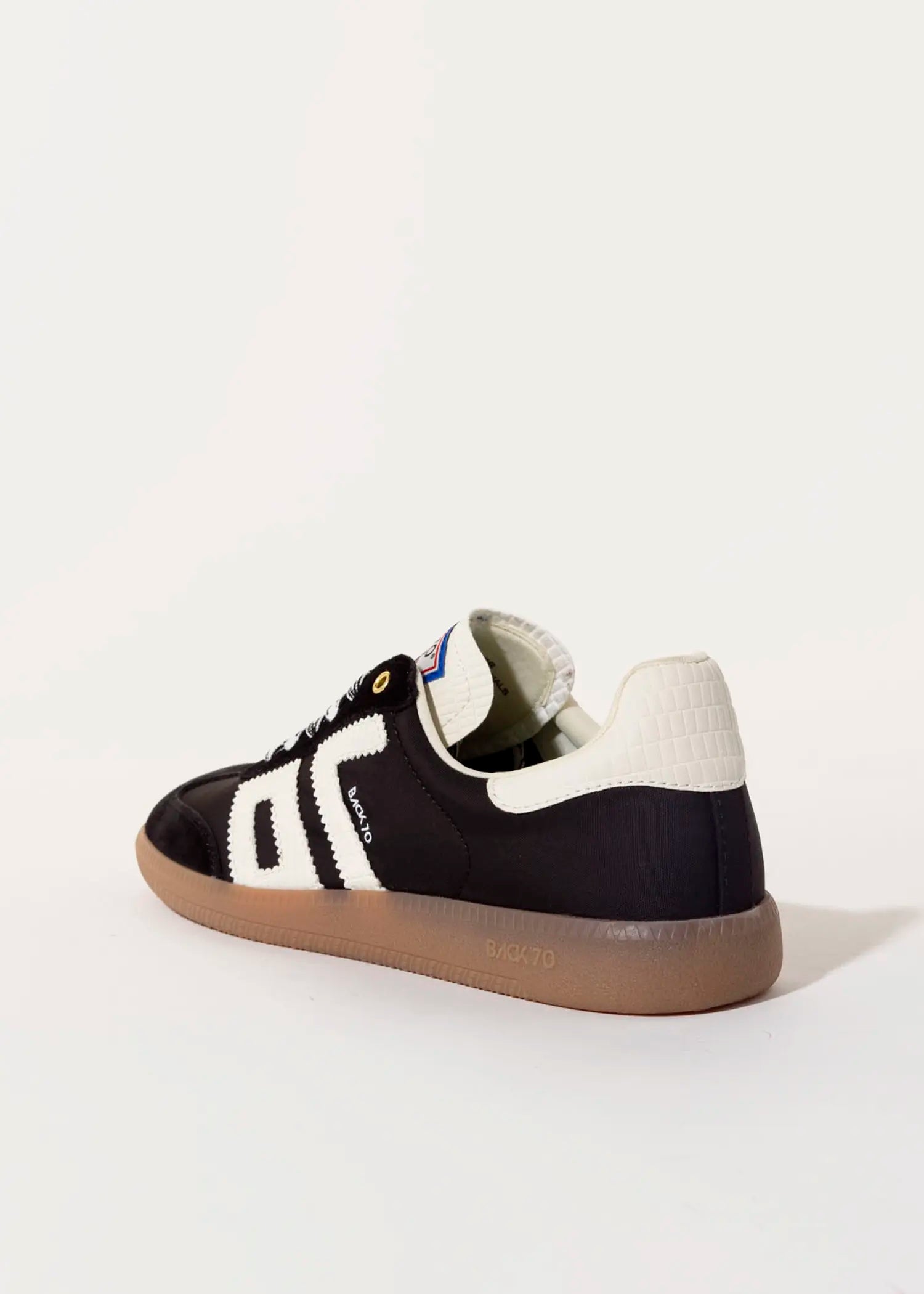 swatch_Black ghost sneakers