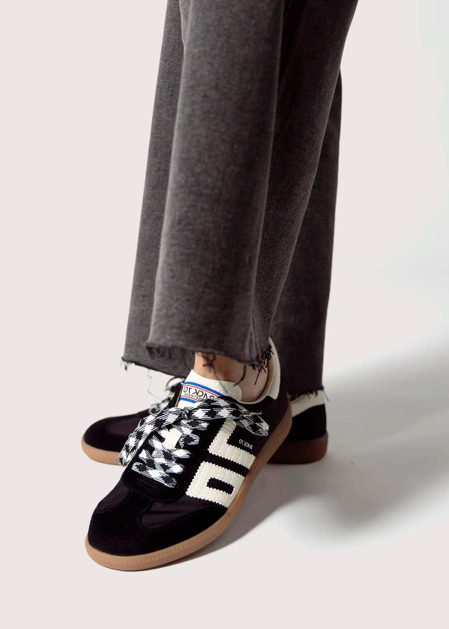 swatch_Black ghost sneakers