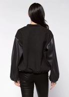 swatch_Black faux leather bubble bomber jackets