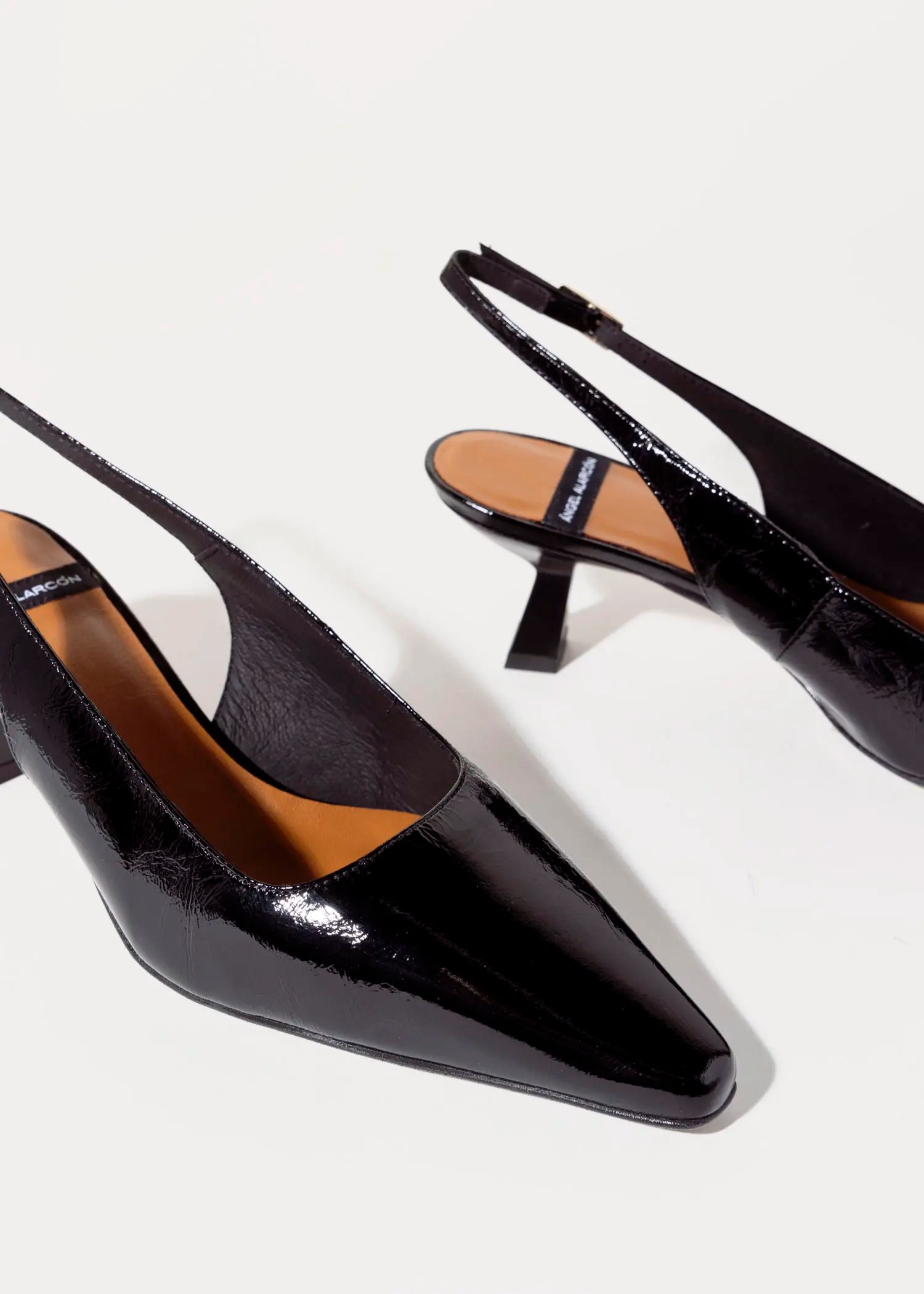 swatch_black patent slingback pump heels