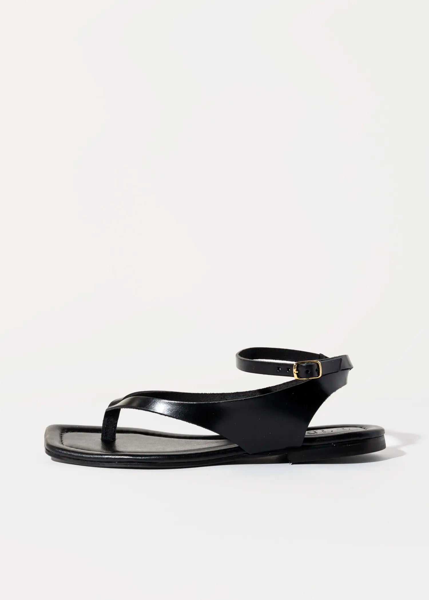 swatch_black leather flat thong sandal flat sandals