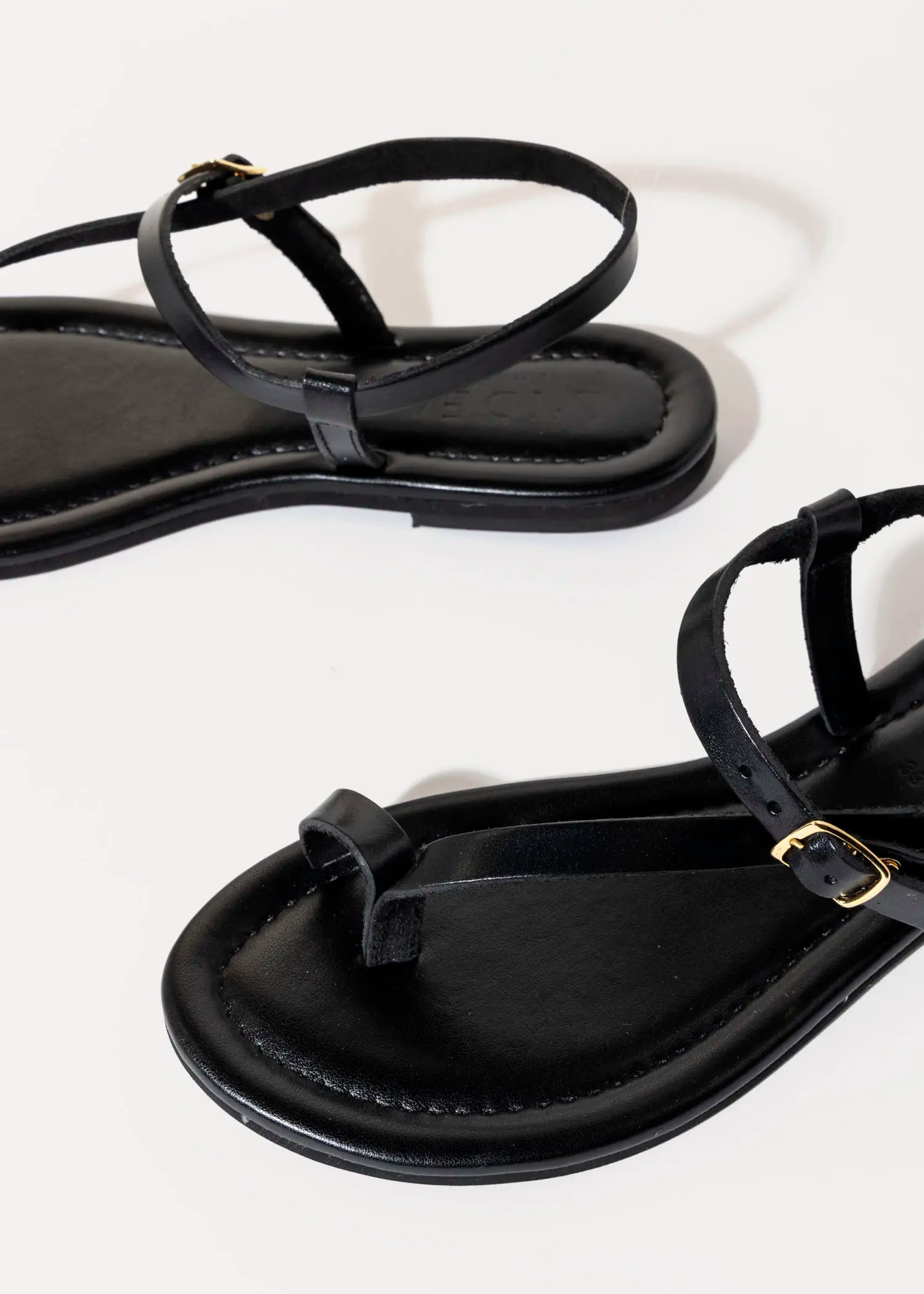 swatch_black leather strappy leather sandal flat sandals