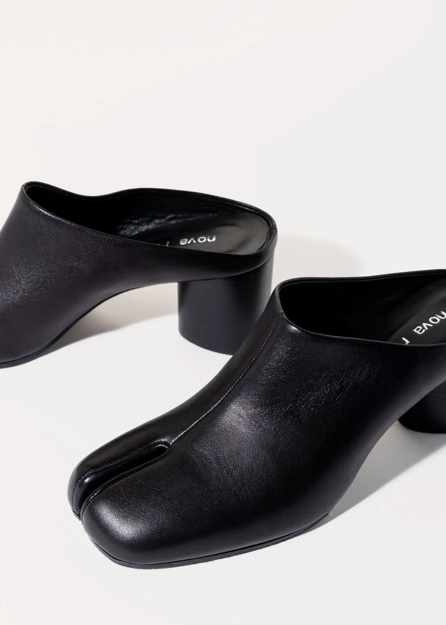 swatch_black leather tabi mule heels