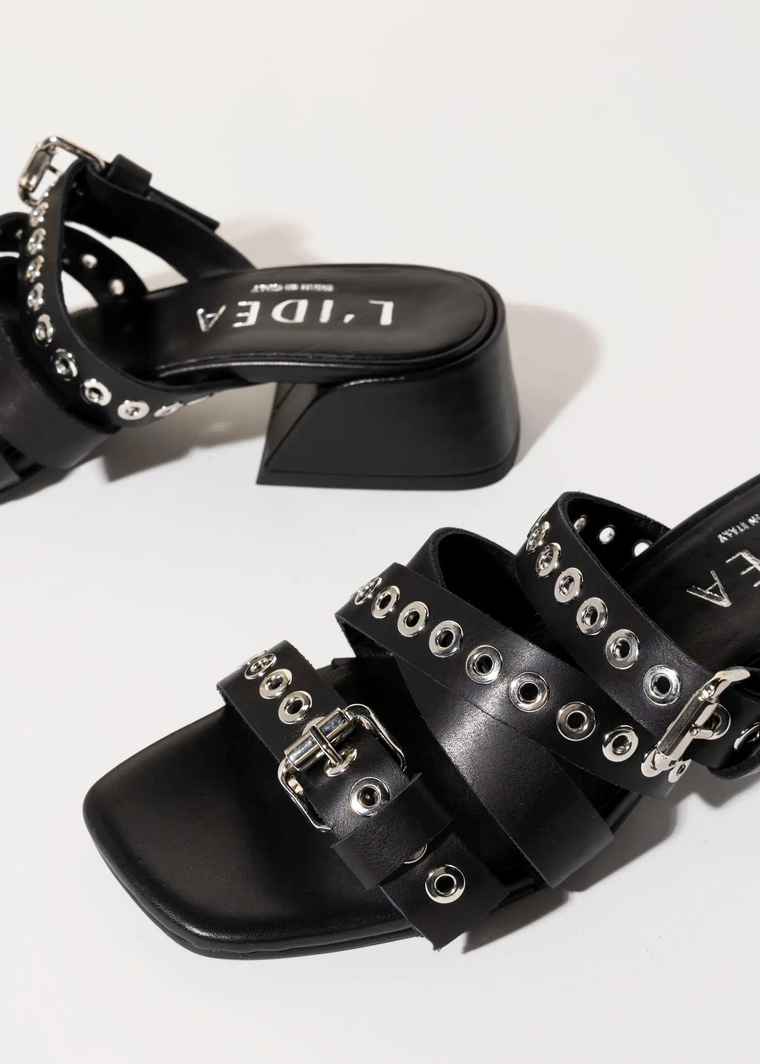 swatch_black leather heeled slide sandal heeled sandals