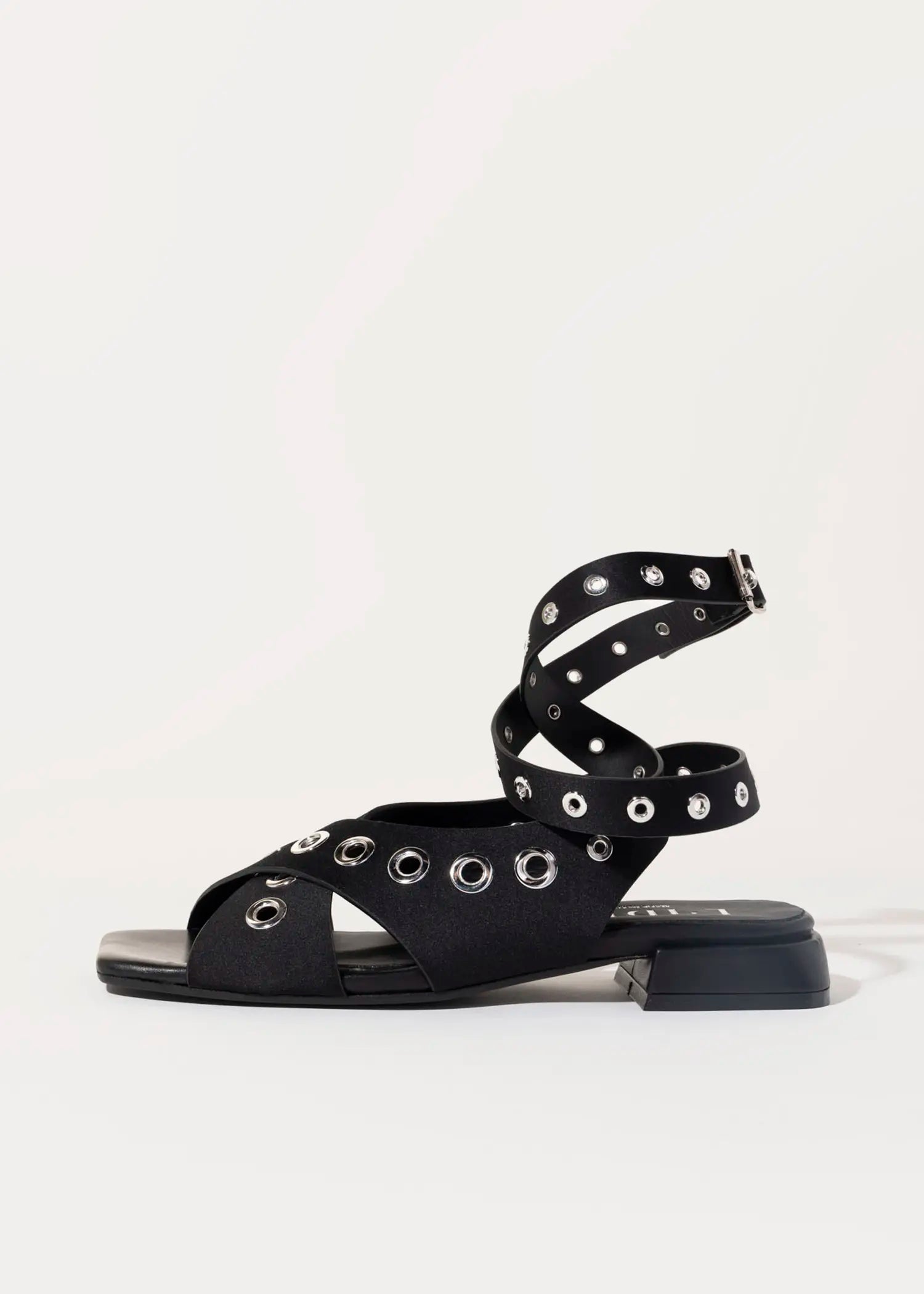 swatch_black satin flat sandal with grommets flat sandals