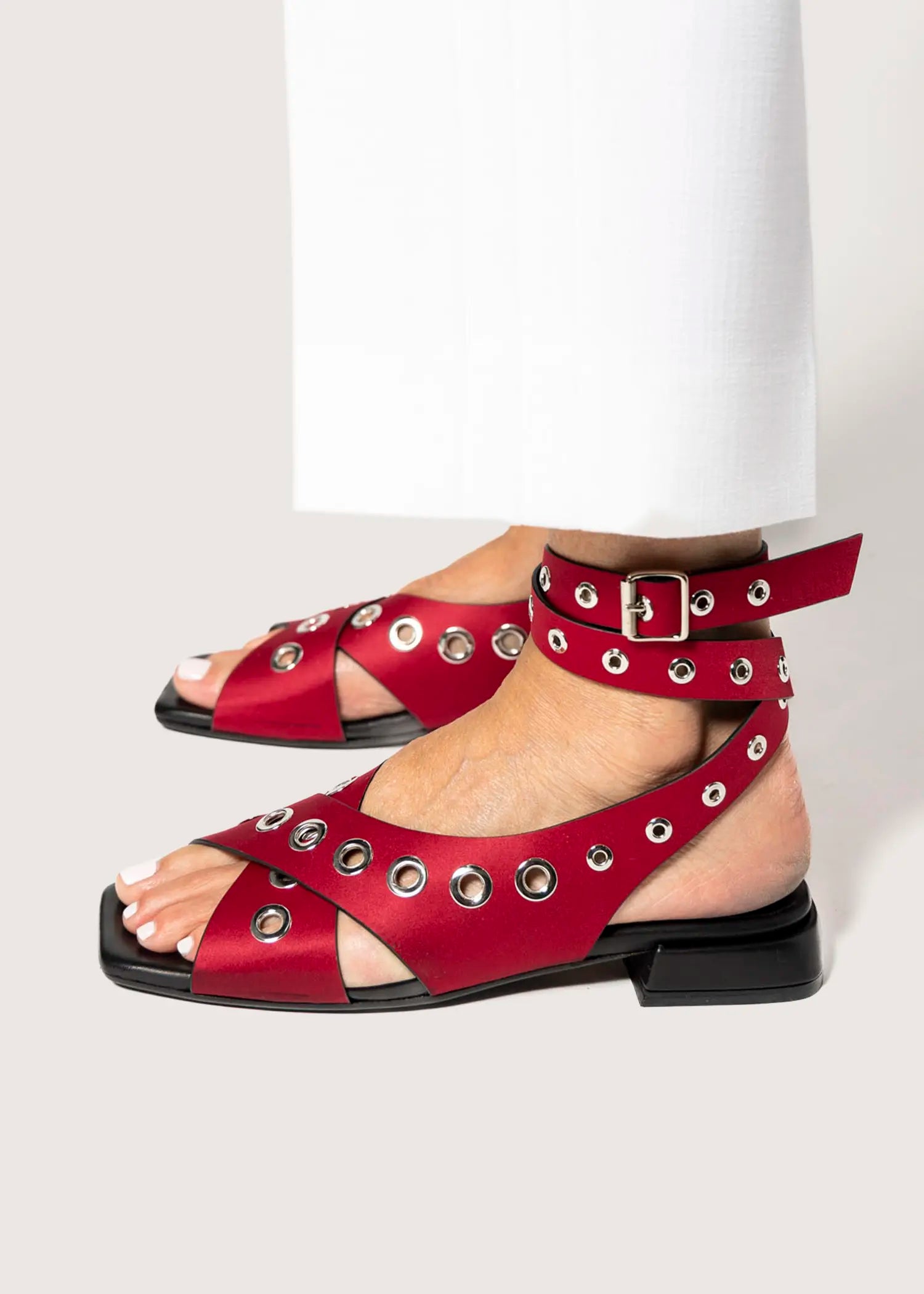 swatch_red satin flat sandal with grommets flat sandals